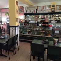 Logótipo de Pizzaria O Mota — Restauração em Fornos de Algodres