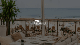 Logótipo de Clássico Beach Bar — Restauração em Almada