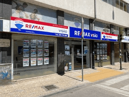 Logótipo de RE/MAX Visão — Imobiliário em Coimbra