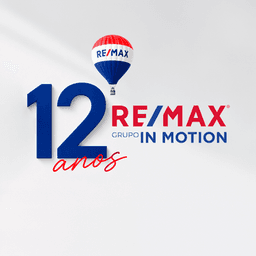 Logótipo de RE/MAX In Motion — Imobiliário em Peniche