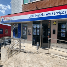 Logótipo de RE/MAX Vila III — Imobiliário em Sintra