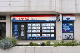 Logótipo de RE/MAX Rigor — Imobiliário em Vila Real
