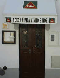 Logótipo de Adega Típica Vinho e Noz — Restauração em Évora