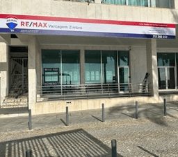 Logótipo de RE/MAX Vantagem Zimbra — Imobiliário em Sesimbra